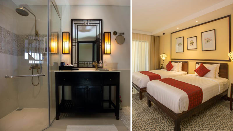 Badrum med dusch och dubbelrum med tv enkelsngar p hotell Little hoian Central Boutique & spa i Hoi An, Vietnam.